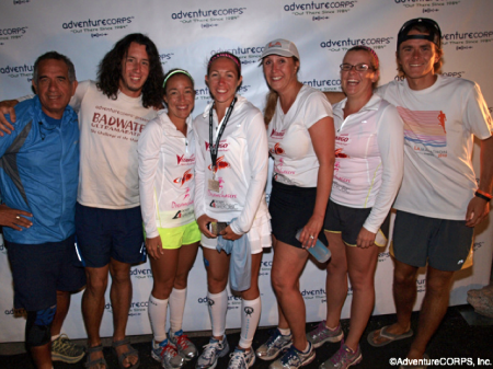 Team Injinji teammates Nick Hollon (2nd from left) and Alexa (center) at the finish line last year