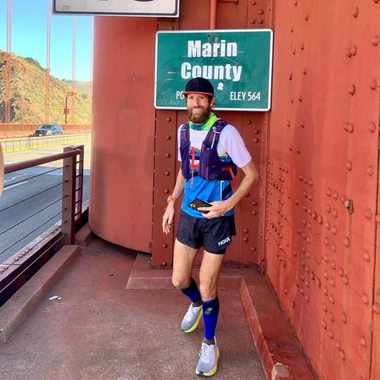 Mike Wardian posing on the Golden Gate Bridge. 