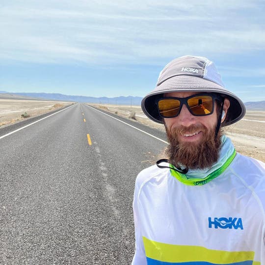 Mike Wardian in the middle of an empty highway. 