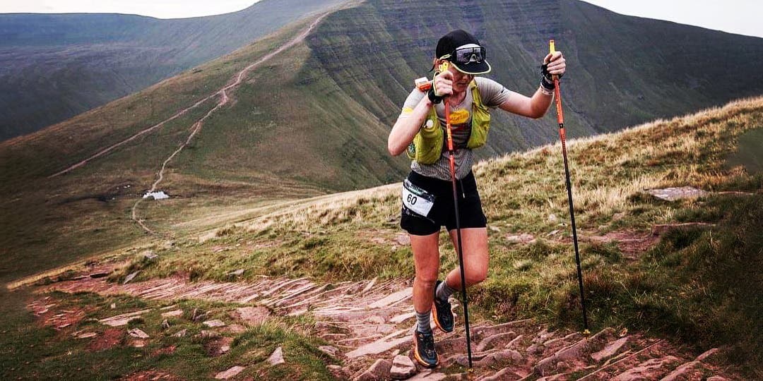 Team Injinji Athlete Alyssa Clark trekking during a race at high altitude.