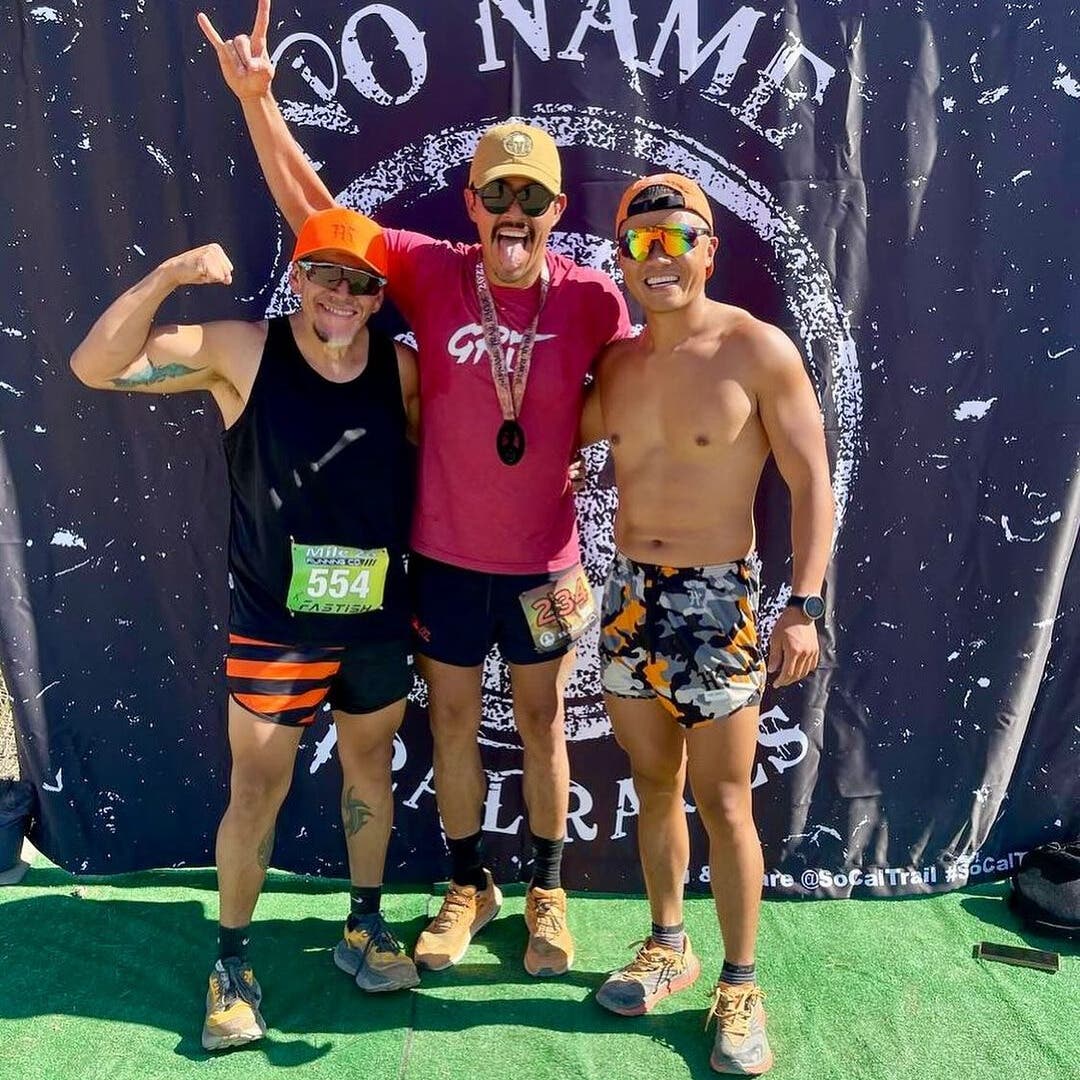 Team Injinji athlete Justin Nucum with a couple of friends at a the No Name race.