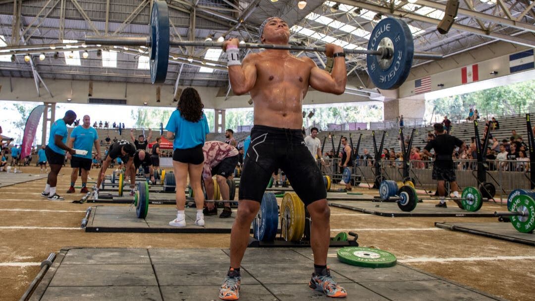 Team Injinji athlete Justin Nucum competeing at a CrossFit competition.