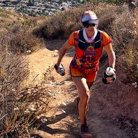 Angela Shartel working her way uphill on a rocky race course. 