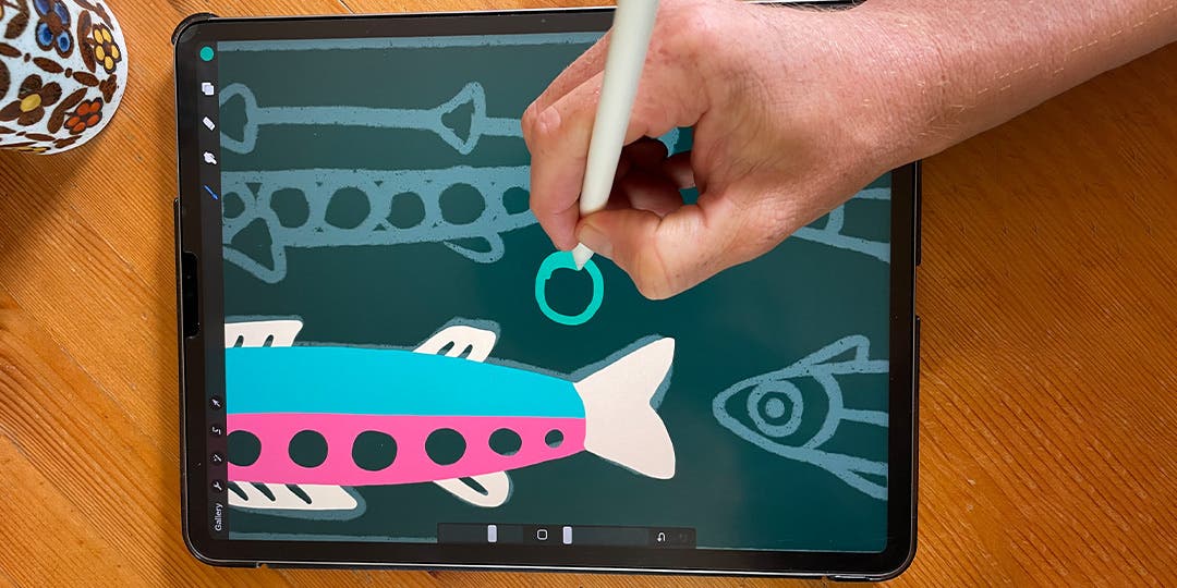 Wyatt Hersey's hand holding the stylus and drawing on a digital pad. 