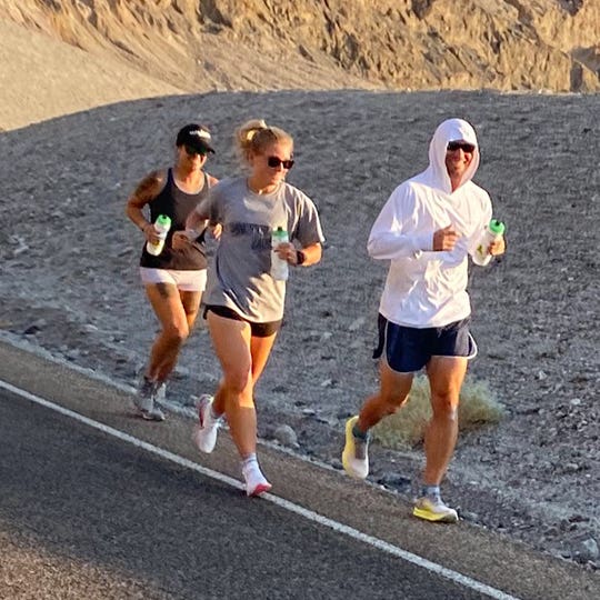 Jonathan Gunderson and his two pacers giving a quick smile for the camera during the race Jonathan Gunderson and his two pacers giving a quick smile for the camera during the race
