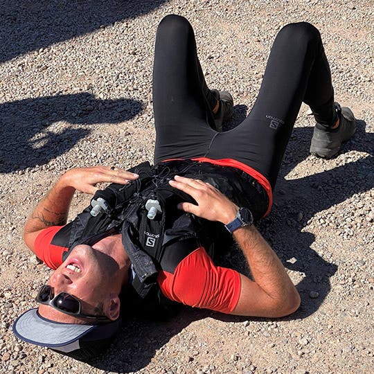 Mike McKnight Celebrating A Successful, Yet Tough Victory By Laying Down After Finishing