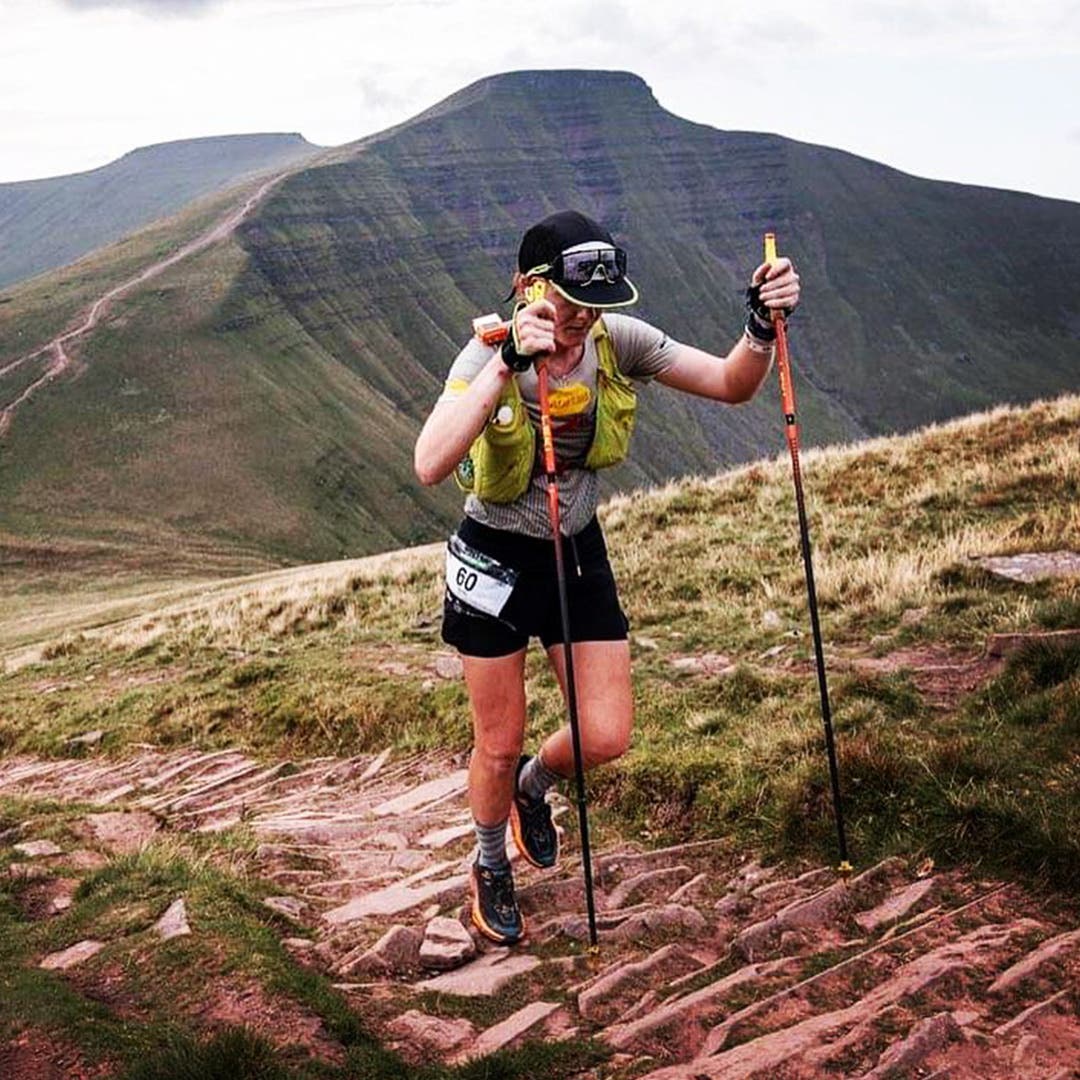 Team Injinji Athlete Alyssa Clark trekking during a race at high altitude.