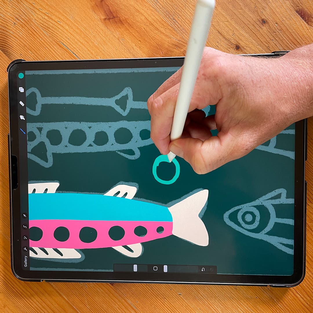 Wyatt Hersey's hand holding the stylus and drawing on a digital pad. 