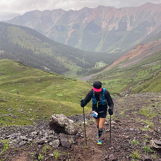 Michael Wardian Hiking Up A Rocky Mountainside