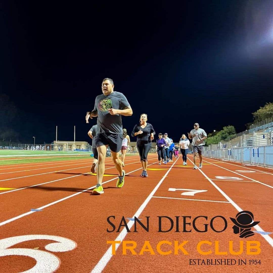 San Diego Track Club members running in the evening on the SDTC track. 