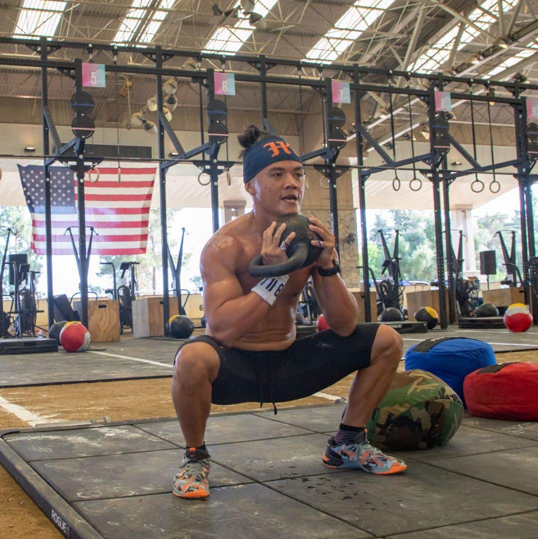 Team Injinji athlete Justin Nucum competeing at a CrossFit competition. 