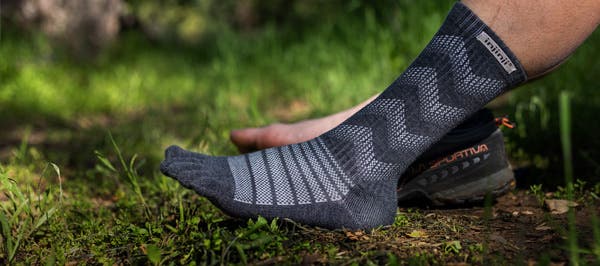 Putting socks on feet