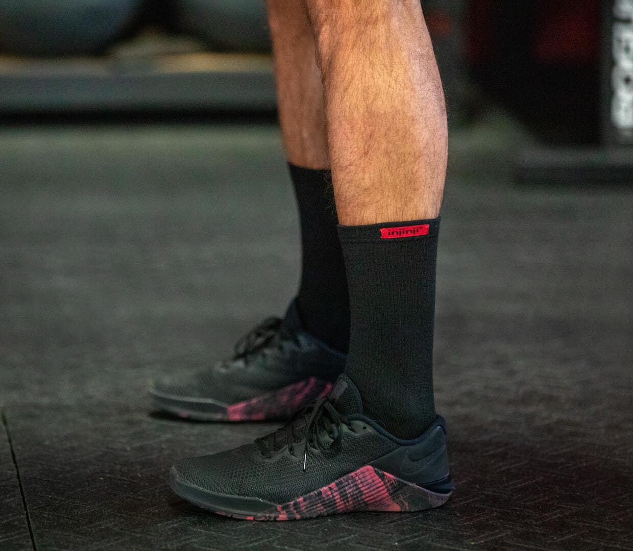 Person standing with shoes and socks on