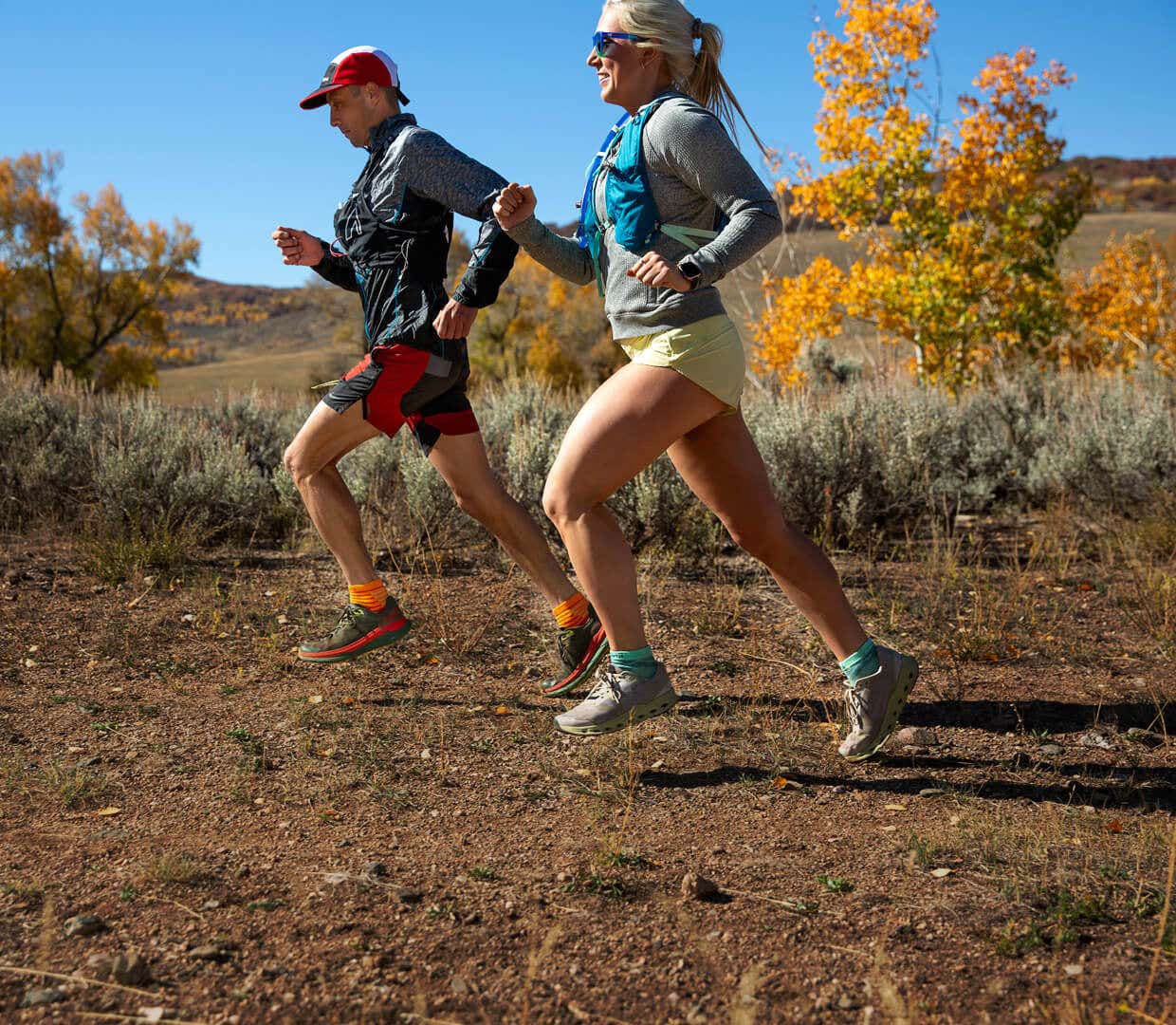Two people running together