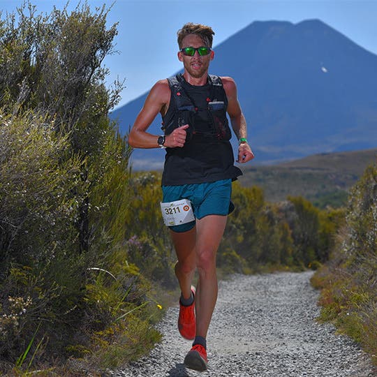 Man running the Tussuck Traverse trail race in New Zealand. Man running the Tussuck Traverse trail race in New Zealand.
